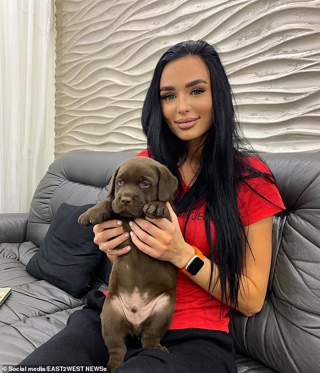 She denies the charge, saying she withdrew the cash at her husband's request