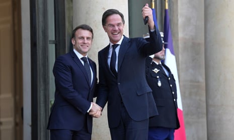 French president Emmanuel Macron, left, greets Nato secretary general Mark Rutte as he arrives for an informal meeting of leaders from key European Union nations and the United Kingdom at the Élysée Palace in Paris.