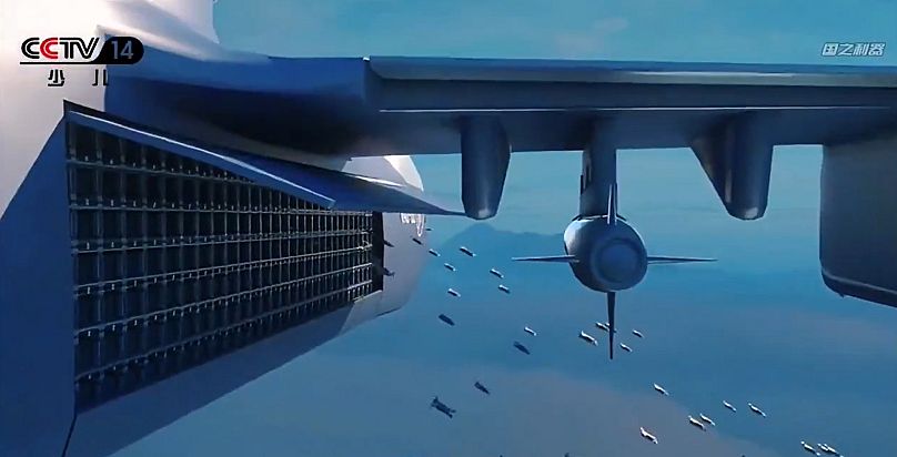 A screenshot from a CCTV 14 video showing a visualisation of the Jiu Tian drone mothership