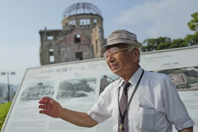 O Kunihiko Iida